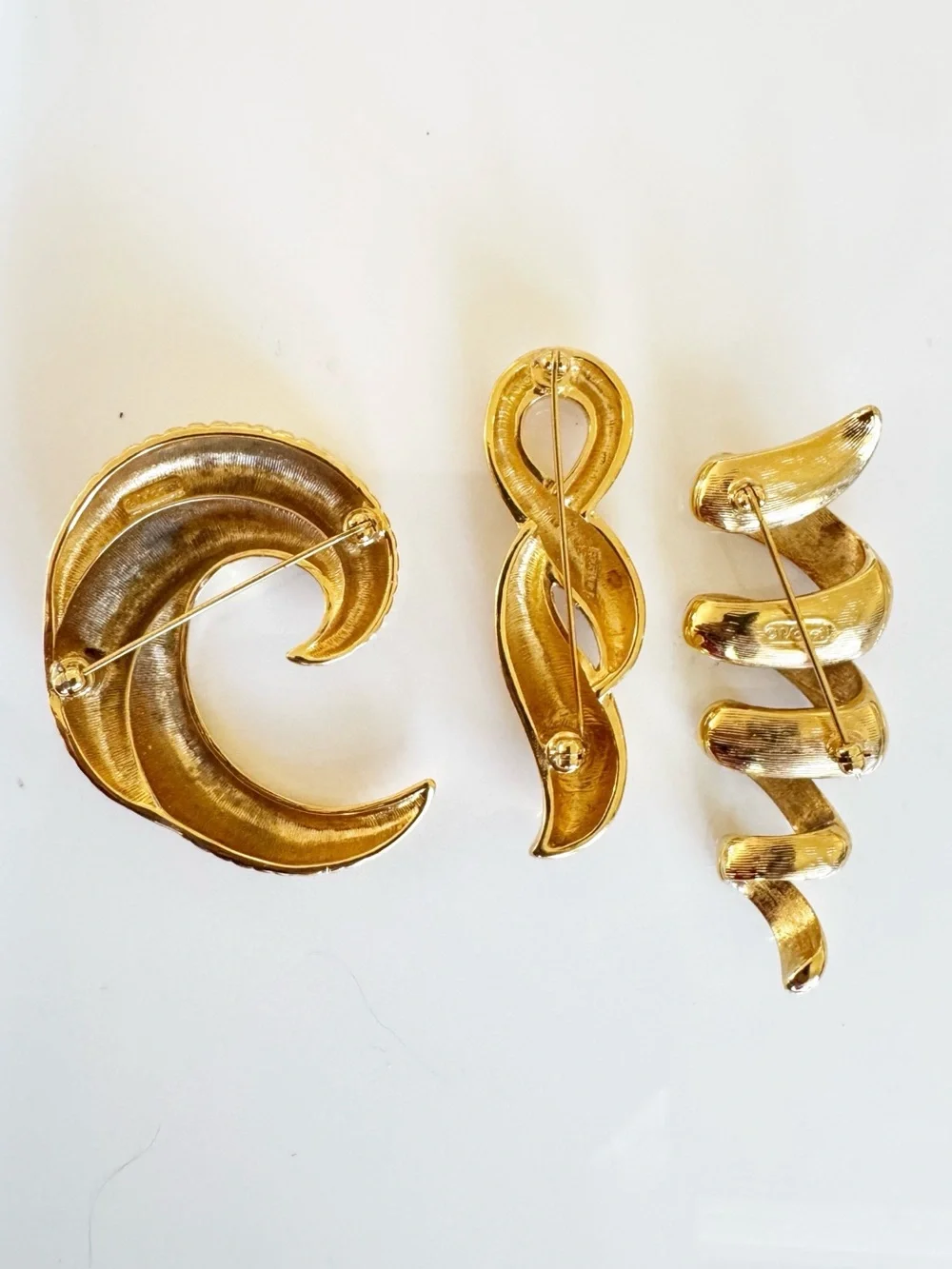 Monet Gold-Tone Spiral Brooch Trio - Sculptural Swirl Designs